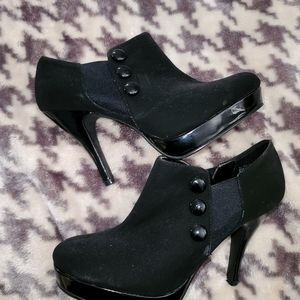Black booties with a heel
